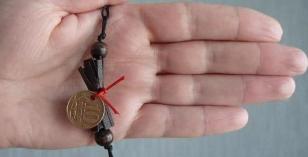 pinigų amuletas nuo šamanas
